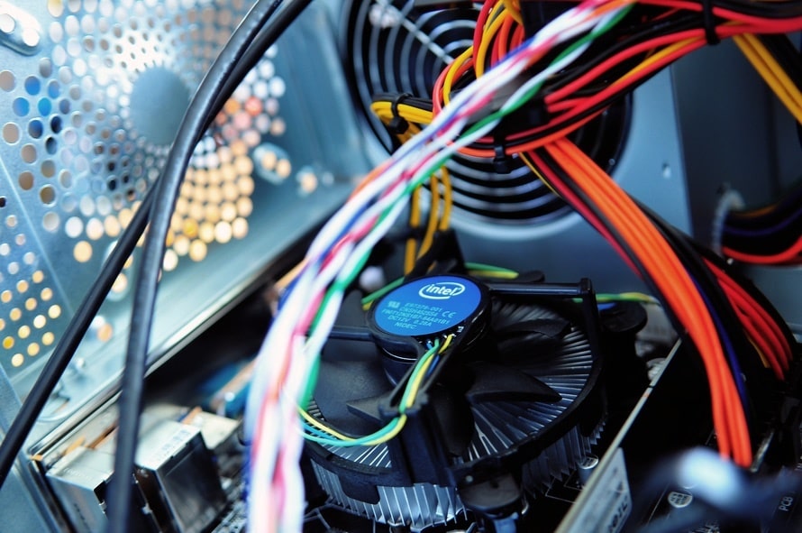 the inside of a computer case with wires