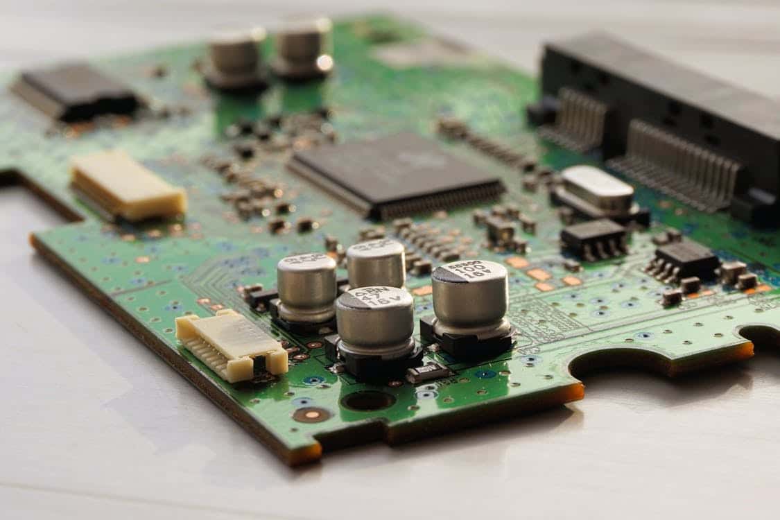 a close up of a computer motherboard with many electronic components