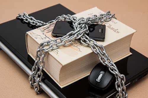 a book with a chain attached to it